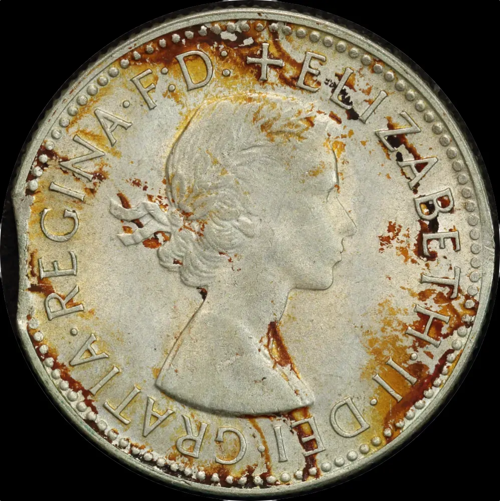1960 Shilling Clipped Planchet Error about Unc