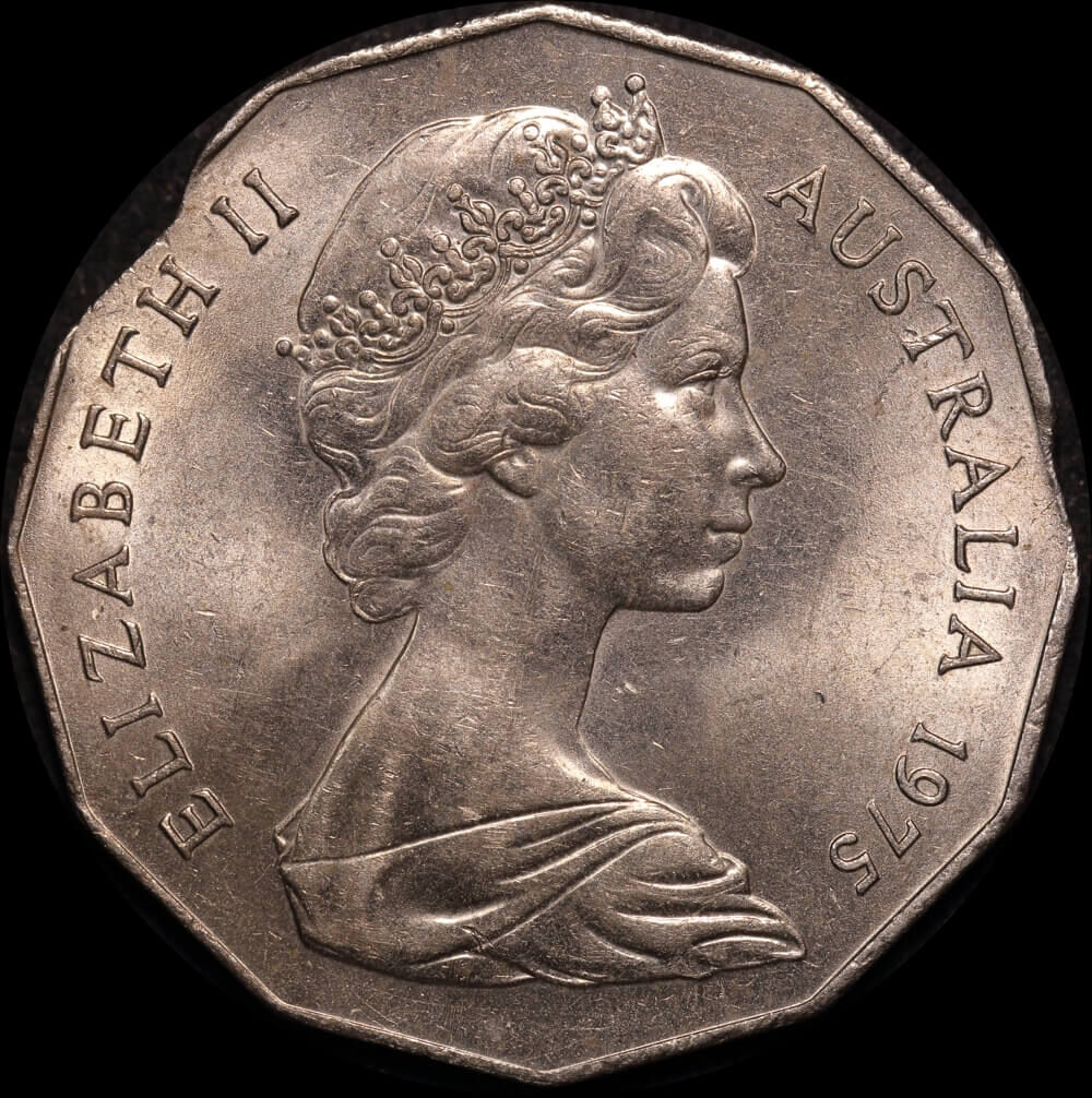 1975 50 Cent Error Double Clipped Planchet about Unc