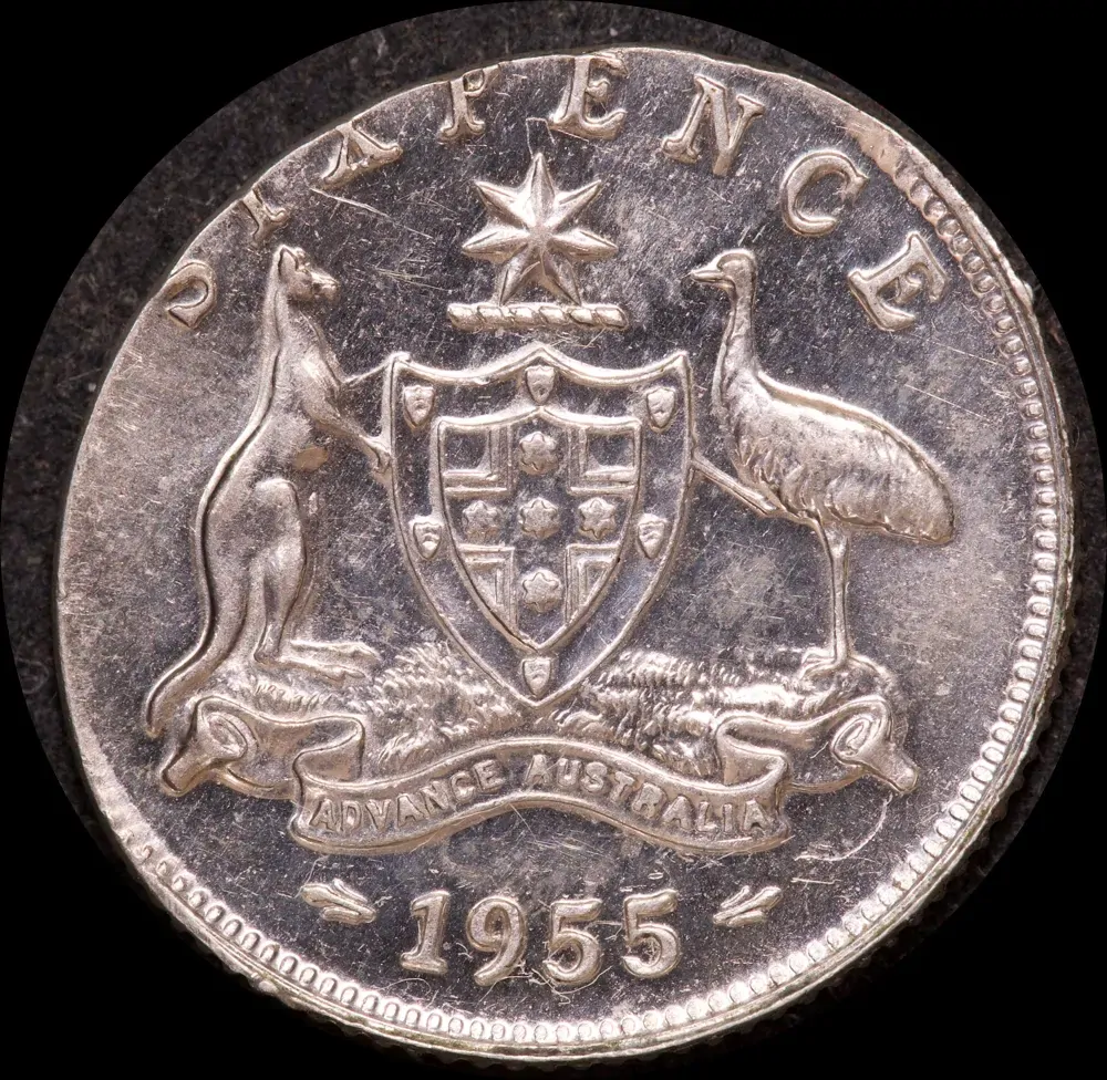 1955 Sixpence Clipped Elliptical Planchet about Unc  product image