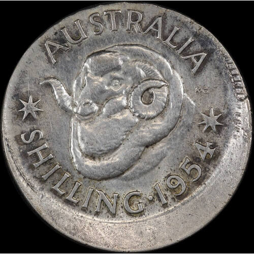 1954 Shilling 4mm Offstrike Error about Unc